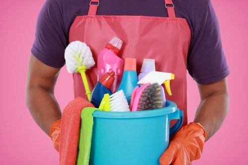 A cleaner in Pimlico sorting recyclable materials for collection